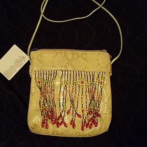 green snakeskin handbag